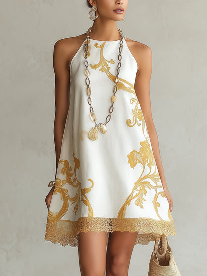 Laurent | Minivestido blanco de encaje con estampados dorados