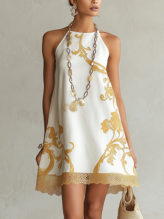 Laurent | Minivestido blanco de encaje con estampados dorados