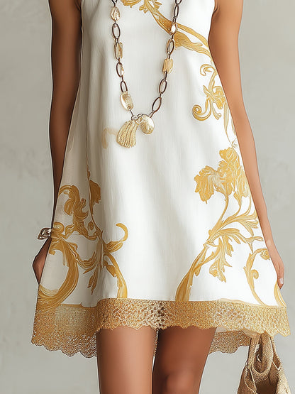 Laurent | Minivestido blanco de encaje con estampados dorados