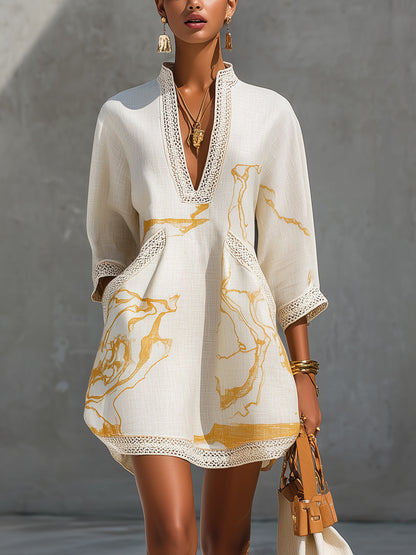 Laurent | Minivestido de encaje de ganchillo color marfil con detalles dorados y escote en V