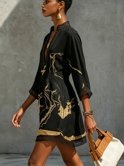 Laurent | Minivestido de ganchillo negro con motivos dorados y escote en V