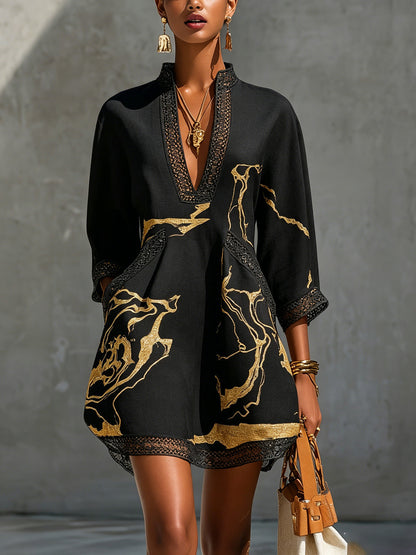 Laurent | Minivestido de ganchillo negro con motivos dorados y escote en V