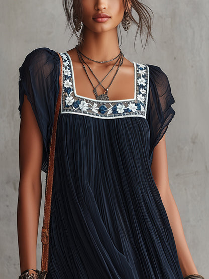 Laurent | Minivestido plisado de gasa con bordado floral azul marino